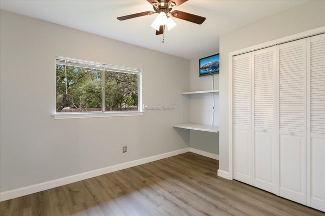 The third bedroom offers a built-in desk nook. | Image 13