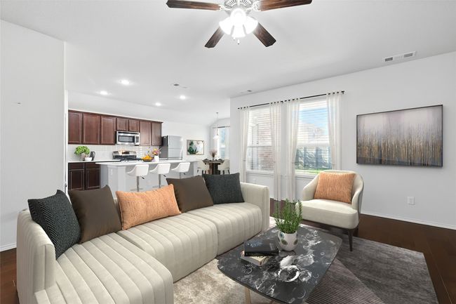 Living room with recessed lighting, dark wood-style floors, visible vents, a ceiling fan, and baseboards | Image 18
