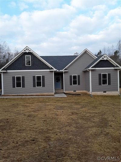 Ranch-style home with a front yard | Image 3