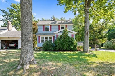 Colonial house with a front lawn | Image 1