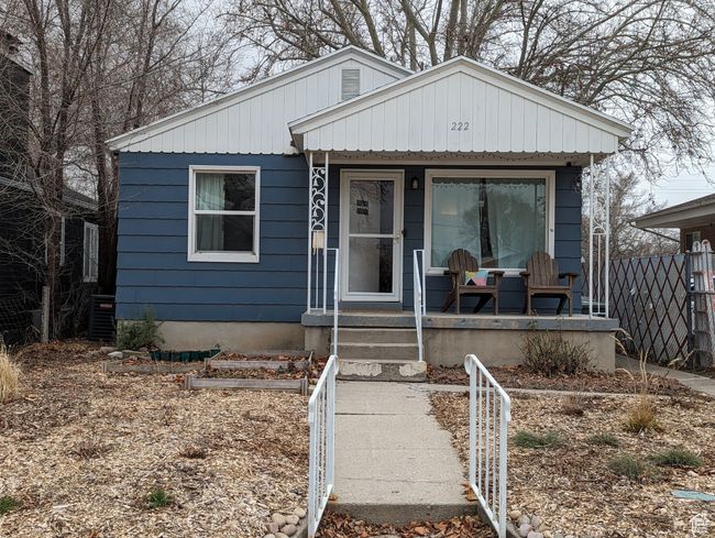 Bungalow-style house featuring a porch, central AC, and fence private yard | Image 14