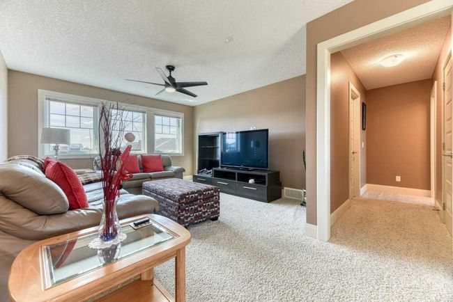 312 Boulder Creek Cres Se, House other with 3 bedrooms, 3 bathrooms and 6 parking in Langdon AB | Image 24