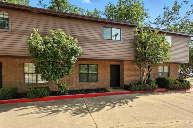 Multi unit property featuring brick siding | Image 17