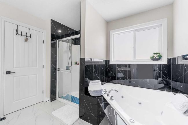 316 Kinniburgh Link, House other with 5 bedrooms, 4 bathrooms and 6 parking in Chestermere AB | Image 30