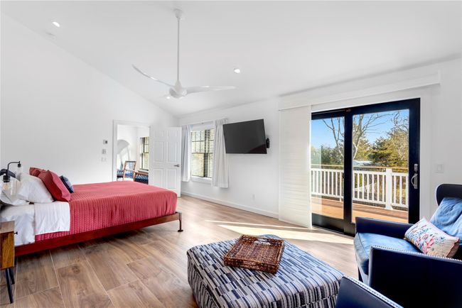 Bedroom with recessed lighting, baseboards, vaulted ceiling, access to outside, and light wood-style floors | Image 19