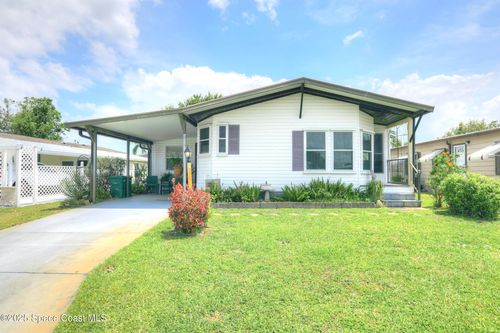 909 Dogwood Dr, Barefoot Bay, FL, 32976-7123 | Card Image