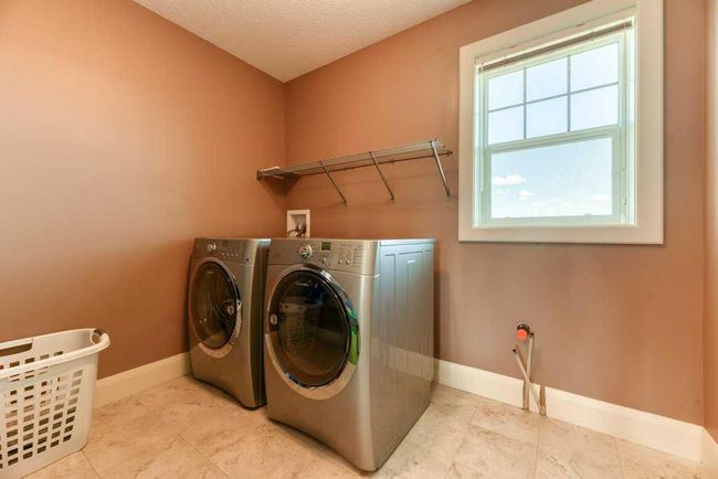 312 Boulder Creek Cres Se, House other with 3 bedrooms, 3 bathrooms and 6 parking in Langdon AB | Image 29