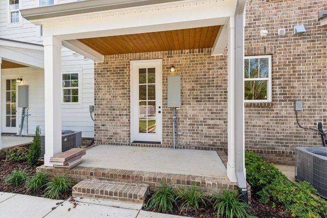 Your new home isn't just attractive from the front-- you'll have something to look forward to whether you walk in your front or back door! Actual photo of home. | Image 36