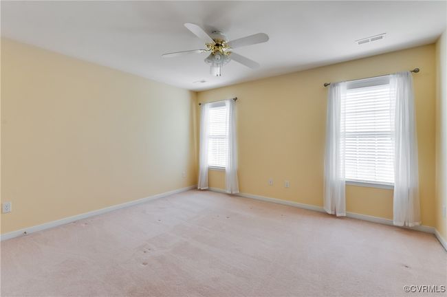 Large closet, ceiling fan, carpet | Image 35