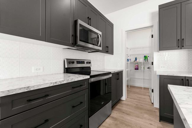 66 Henderson Cres, House other with 4 bedrooms, 4 bathrooms and 2 parking in Penhold AB | Image 15