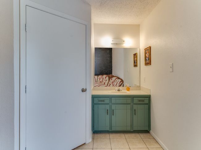 Bathroom featuring vanity and tile patterned flooring | Image 23