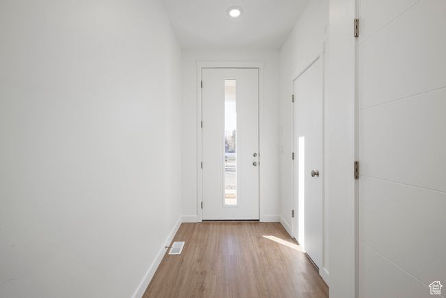 Welcome home. This inviting entry sets the tone with natural light, clean lines, and a warm first impression. | Image 4