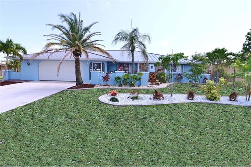 107 Sinclair St Se, PORT CHARLOTTE, FL, 33952-9140 | Card Image