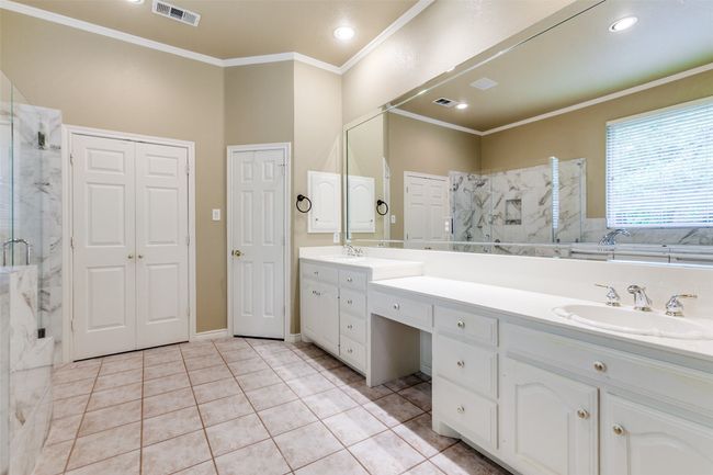 Large bath with lots of light and double sink. | Image 24