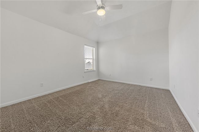 Empty room with carpet floors and ceiling fan | Image 19