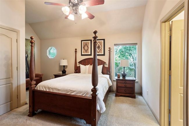 One of the 3 secondary bedrooms upstairs, this one has a connecting shared bath. There is also a walk in attic space inside this closet. | Image 23