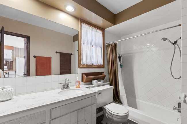 Main floor full bathroom | Image 23