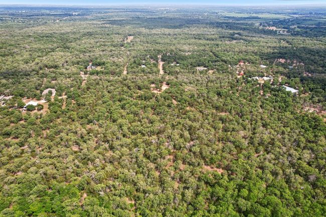 Birds eye view of property with a wooded view | Image 15