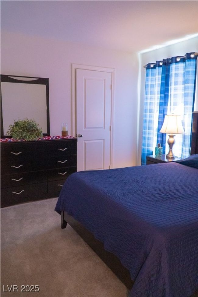 Bedroom with carpet flooring | Image 50