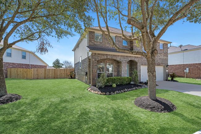 Lots of side yard and beautiful landscaping. | Image 43