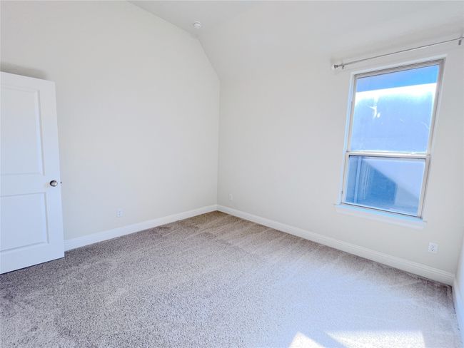 Additional living space featuring carpet flooring and lofted ceiling | Image 33