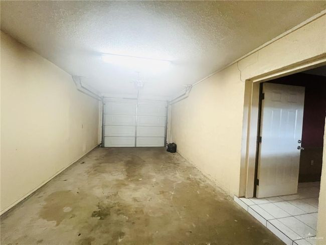 View of garage | Image 19