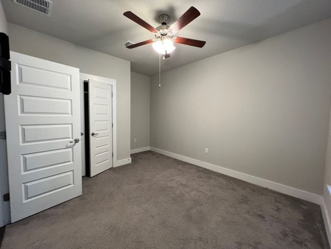 Guest bedroom on main lvl | Image 15