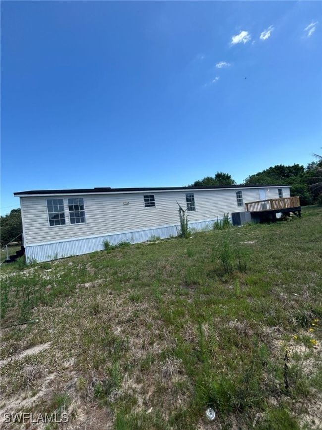 View of front facade featuring a deck | Image 12