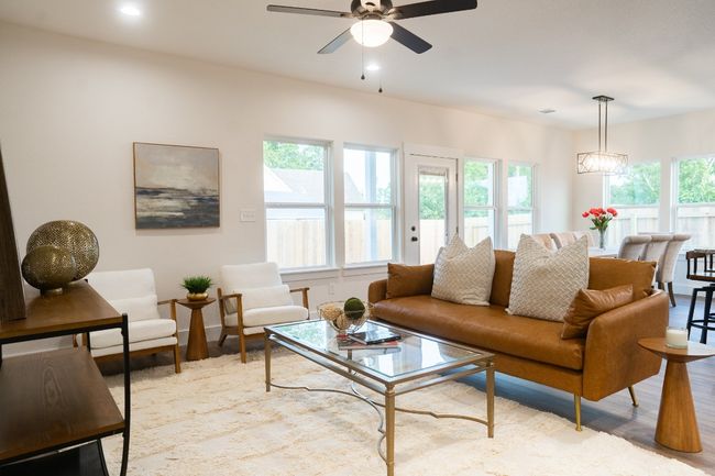 Living area featuring a ceiling fan, light wood-type flooring, and recessed lighting | Image 13