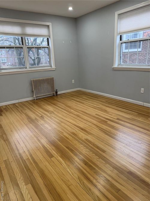 75-f-141-04 77 Ave, New York, NY, 11367 | Card Image