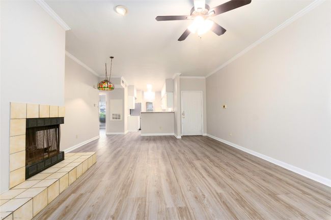 This is a LARGE living/dining area. | Image 17