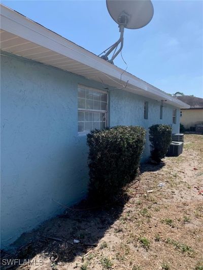 View of property exterior with cooling unit | Image 2