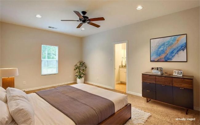 Bedroom featuring connected bathroom, recessed lighting, and a ceiling fan | Image 19