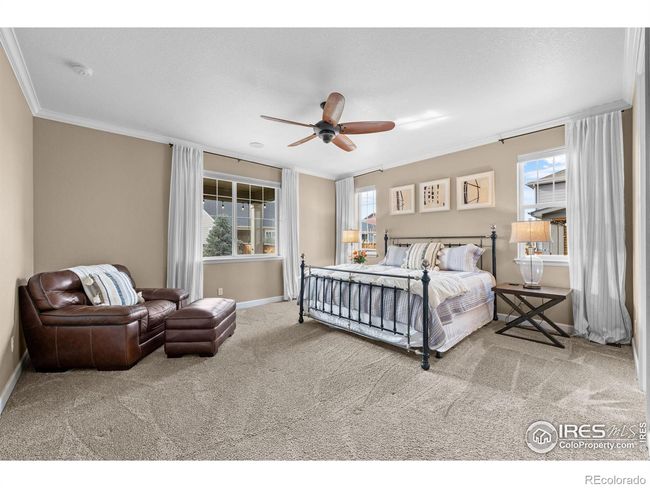 Primary suite on main level with natural light | Image 13