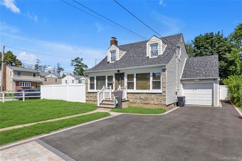 321 Washington Ave, Roosevelt, NY, 11575-1848 | Card Image