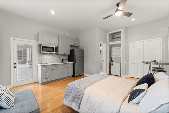 The separate guest quarters is a contemporary retreat, thoughtfully designed with a modern kitchenette and dedicated laundry space... | Image 39