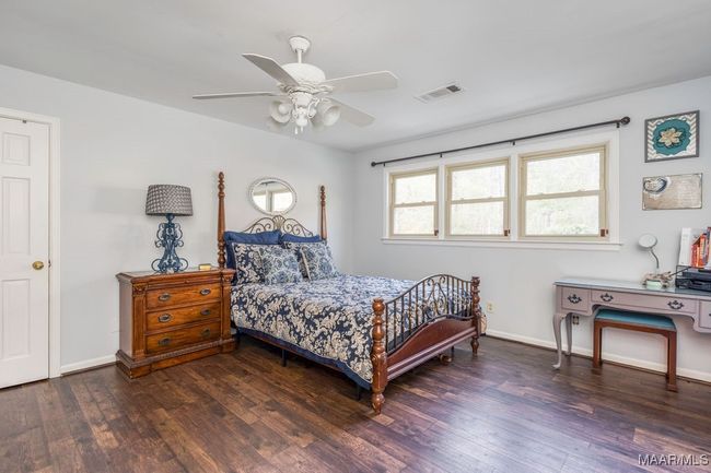 Level 3 bedroom with a walk-in closet that leads to a extra large floored and foam insulated attic storage | Image 53