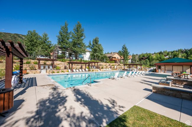 Clubhouse: Community Pool featuring a pergola and a patio | Image 40