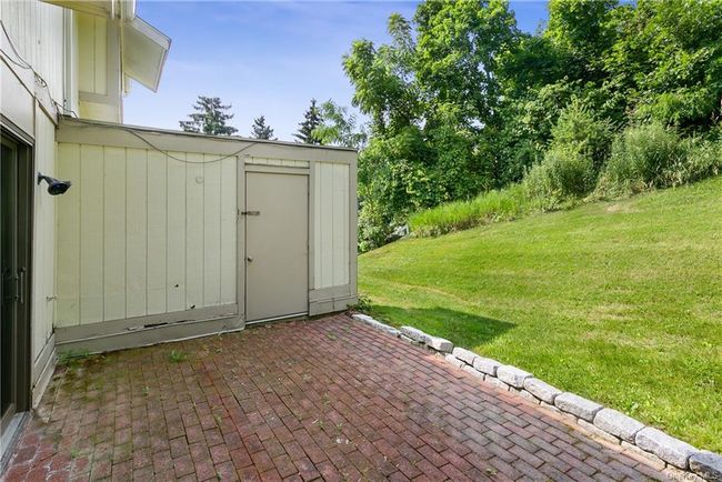 View of patio featuring a shed | Image 23