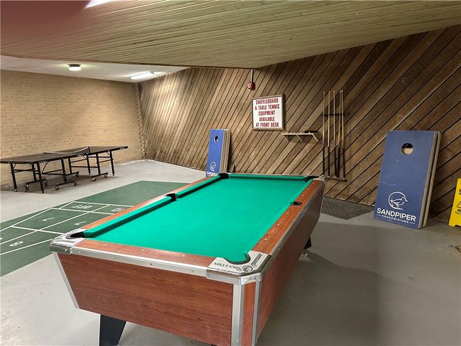 Sandpiper game room with pool, ping pong, corn hole, and shuffleboard. | Image 36