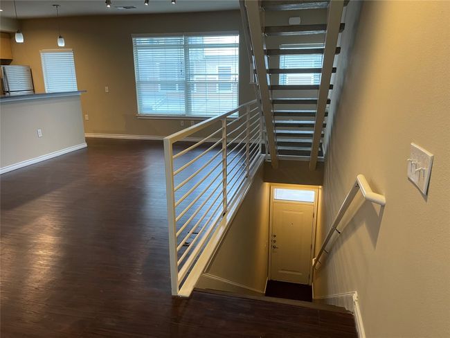 Stairs with wood finished floors | Image 6