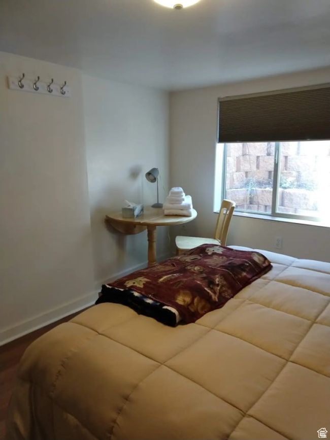 Bedroom with baseboards | Image 12