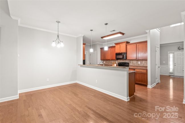Spacious dining space that flows nicely from the kitchen. | Image 5