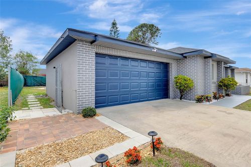 523 Floral Dr, KISSIMMEE, FL, 34743-9415 | Card Image