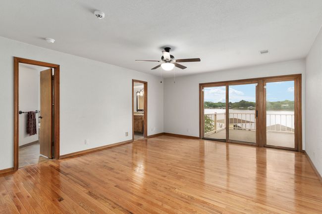 Unfurnished room featuring baseboards, visible vents, a ceiling fan, and light wood-style floors | Image 21