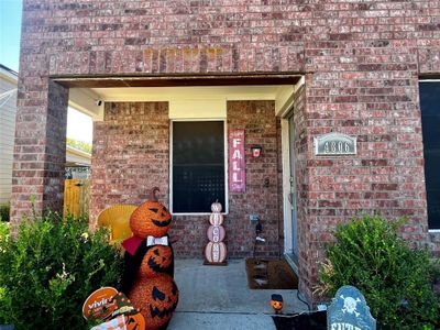 View of doorway to property with covered porch | Image 2