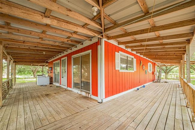 Plenty of ways to enjoy outdoors under your wraparound covered porch. | Image 8