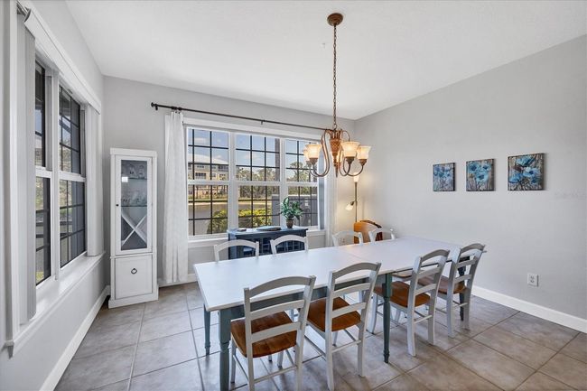 1st floor dining room overlooking pond and Lanai | Image 23