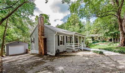 Detached Garage, Paved Driveway, Covered Front Porch. | Image 2