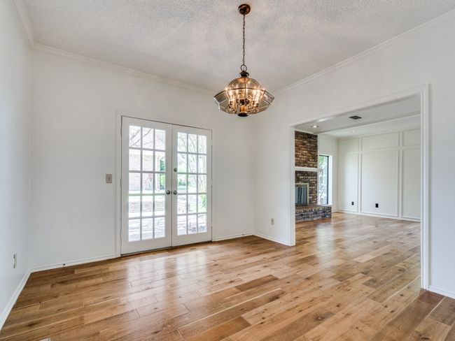 Formal dining with doors to open courtyard for added Spring and Fall entertaining! | Image 39